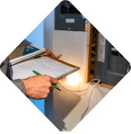 man checking electrical wirings