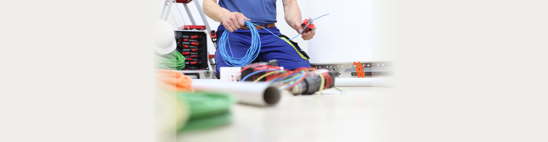 man checking the cable wires