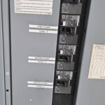 Panel labeling close-up — legible, weatherproof directory after inspection (Encino)