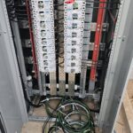 Clean EMT conduit runs on relocated panel — Sherman Oaks inspection passed