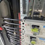 Neat exterior conduit and drip-loop to protect service entrance conductors — LA home