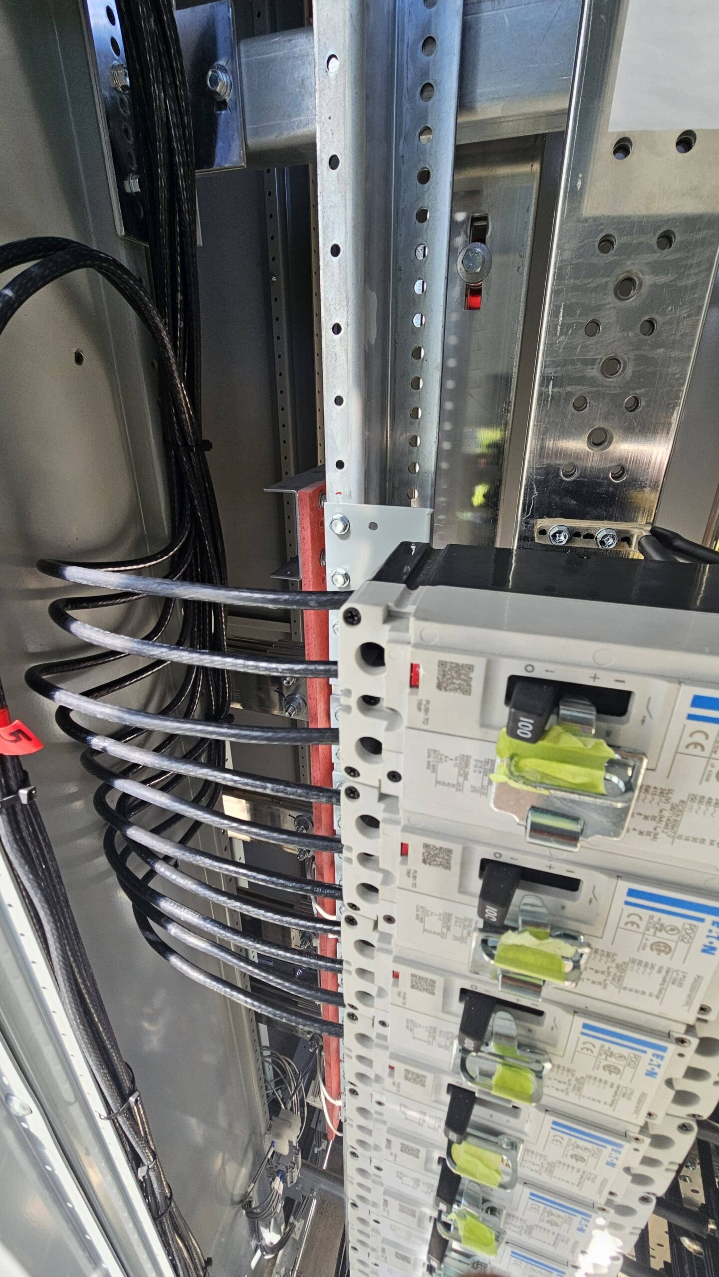 Neat exterior conduit and drip-loop to protect service entrance conductors — LA home